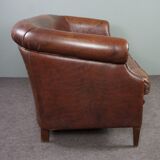 2-seater sofa in sheepskin decorative nails