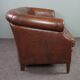 2-seater sofa in sheepskin decorative nails
