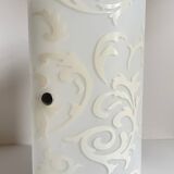 Polished and screen-printed glass sconce by eglo