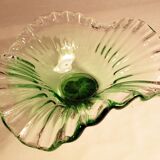 Glass cup on decorated metal stand