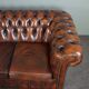 Chesterfield sofa in old cowhide 2.5 seats