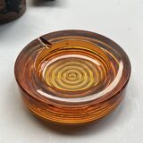 Amber pressed glass ashtray, 1970s design.