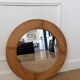 Round Scandinavian pine mirror from the 1970s.
