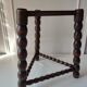 Wood tripod sofa end
