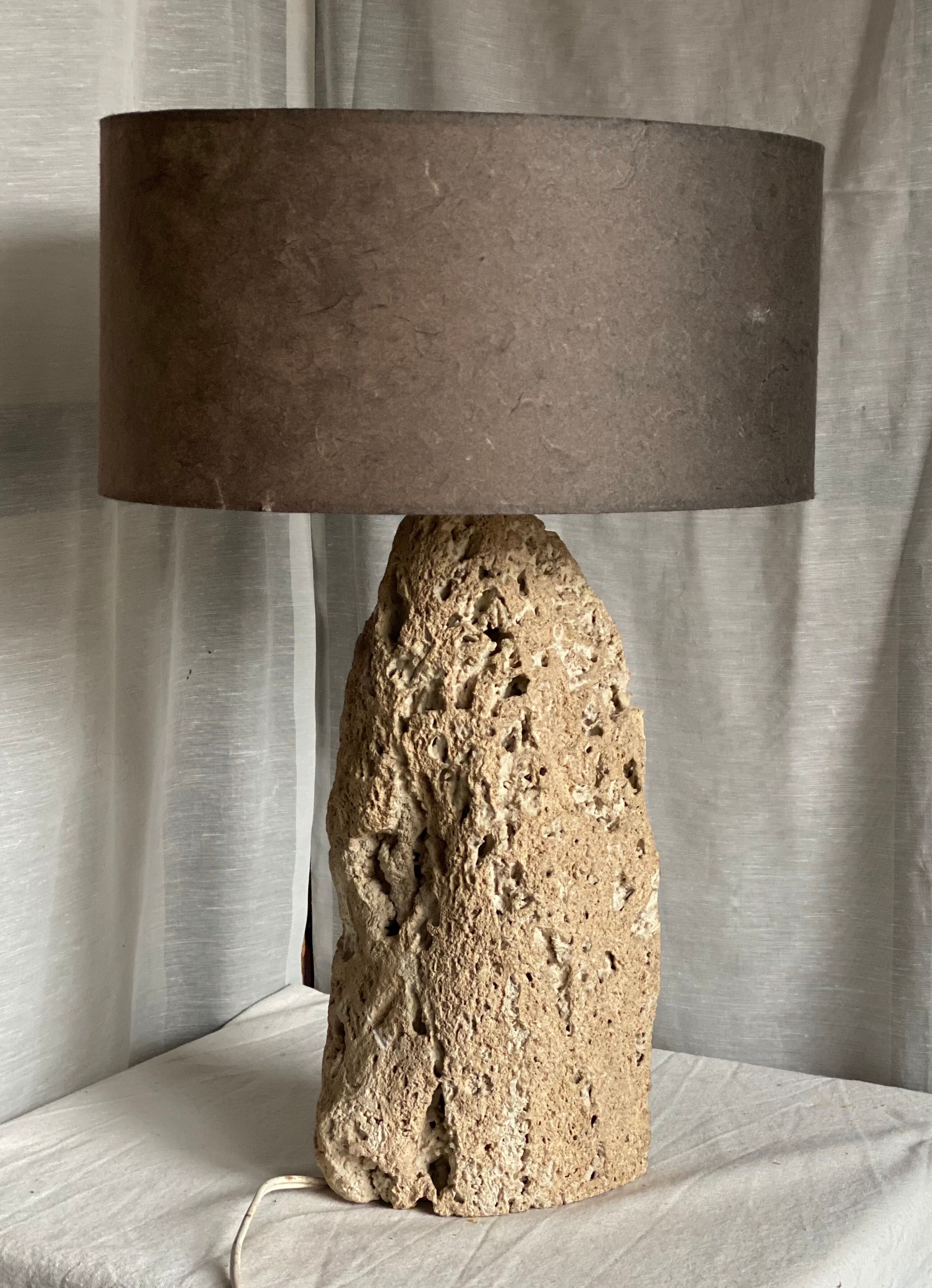 Brutalist vintage stone lamp from the 1970s, raw art.
