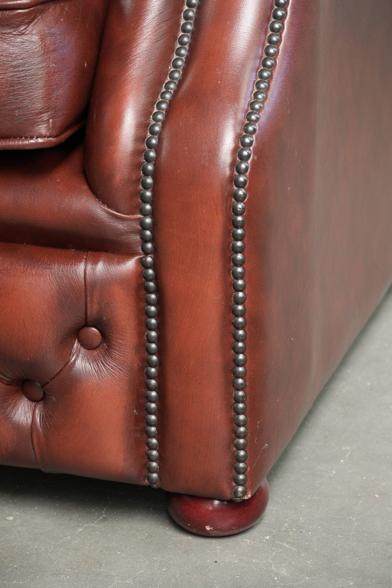 Brown cow leather Chesterfield armchair in a unique design