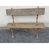 Bench with cast iron legs and branch decor