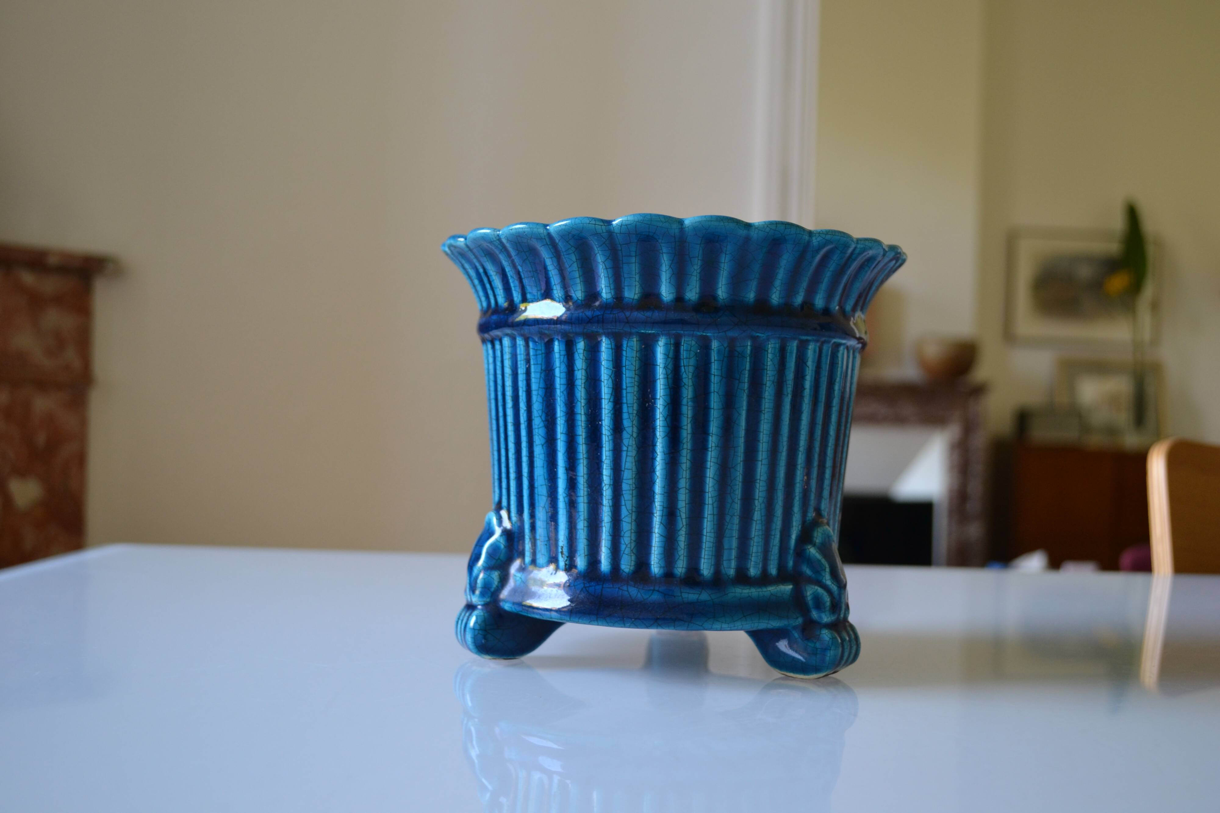 Cracked blue ceramic cache pot
