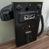 Old bakelite wall telephone