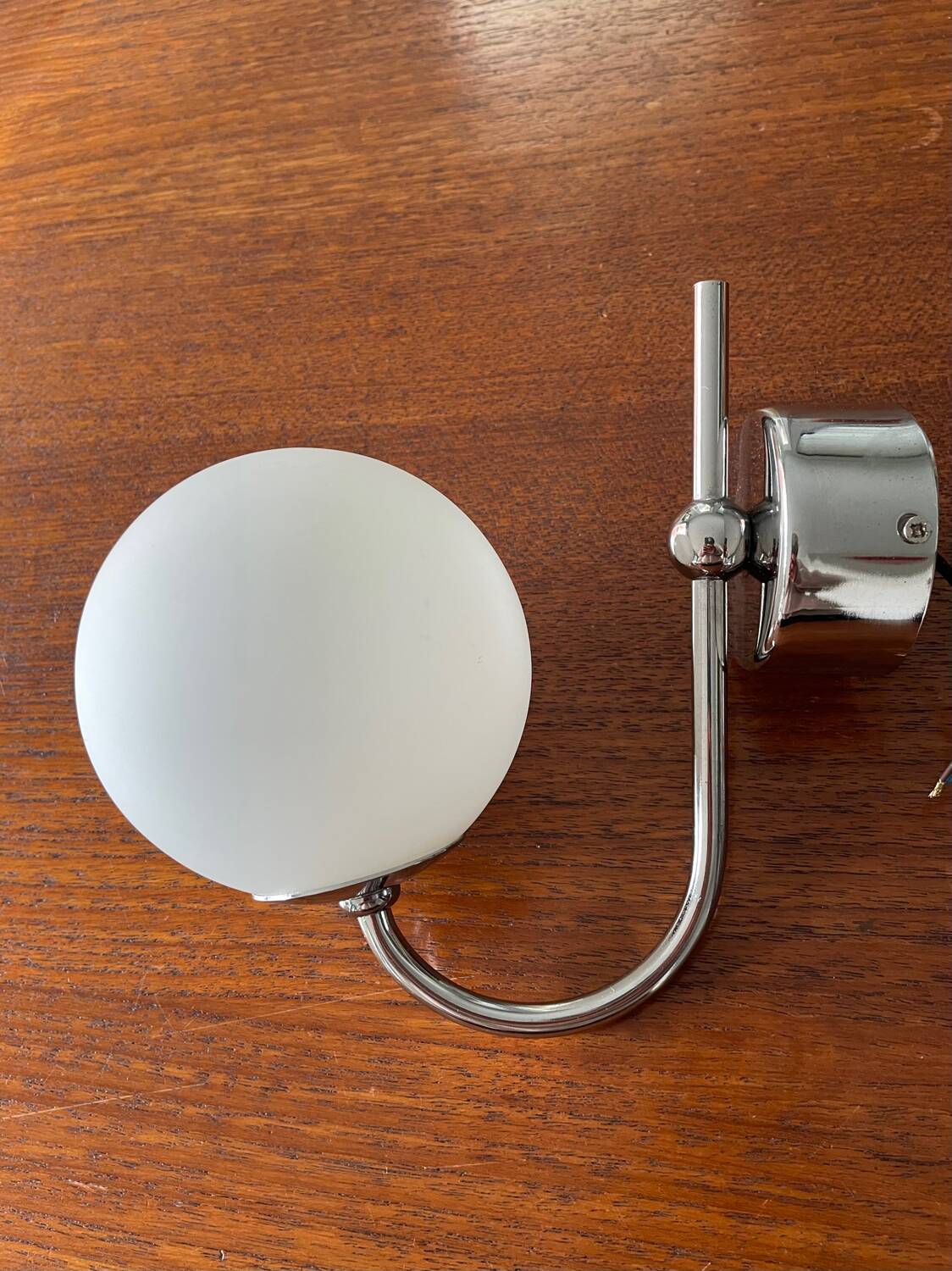 Chrome metal wall light and opaline ball