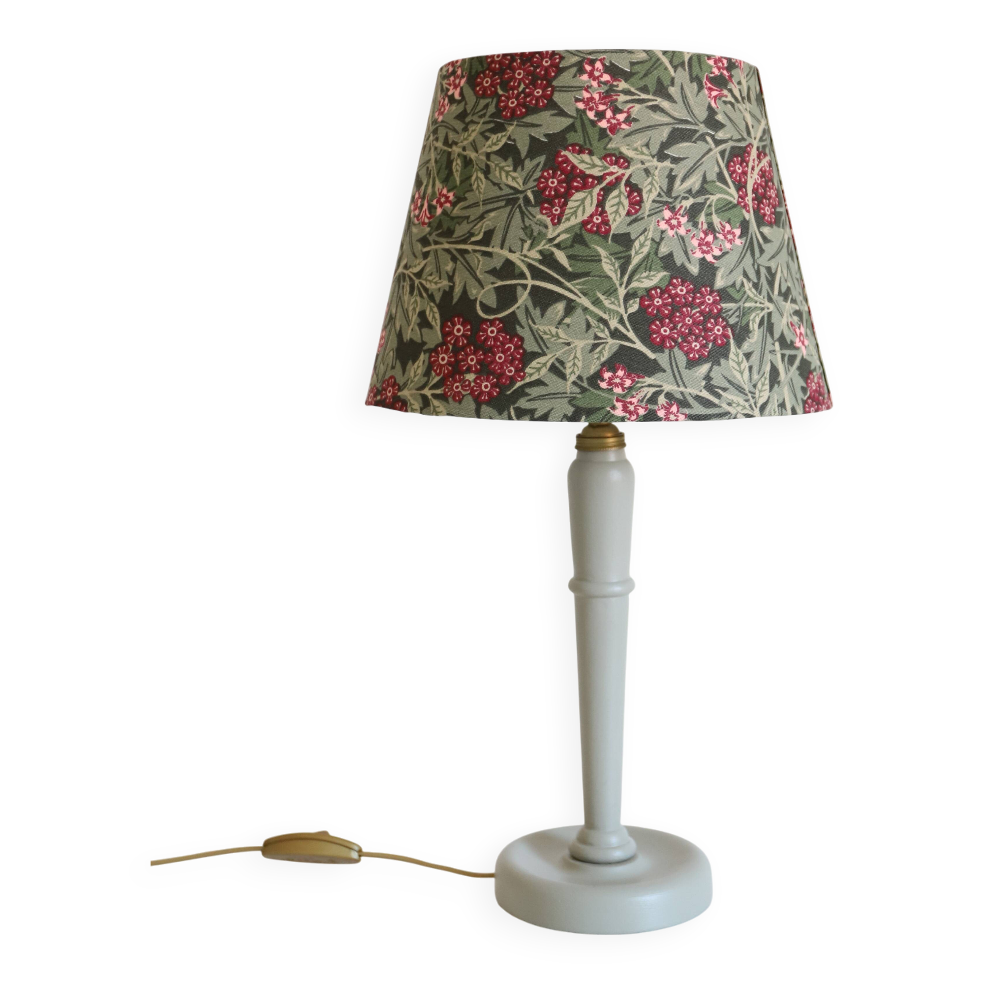 Table lamp, turned wooden base and antique printed lampshade