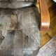 1970s Scandinavian armchair in curved laminated wood with a leather seat.