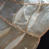 Mother-of-pearl and brass suspension