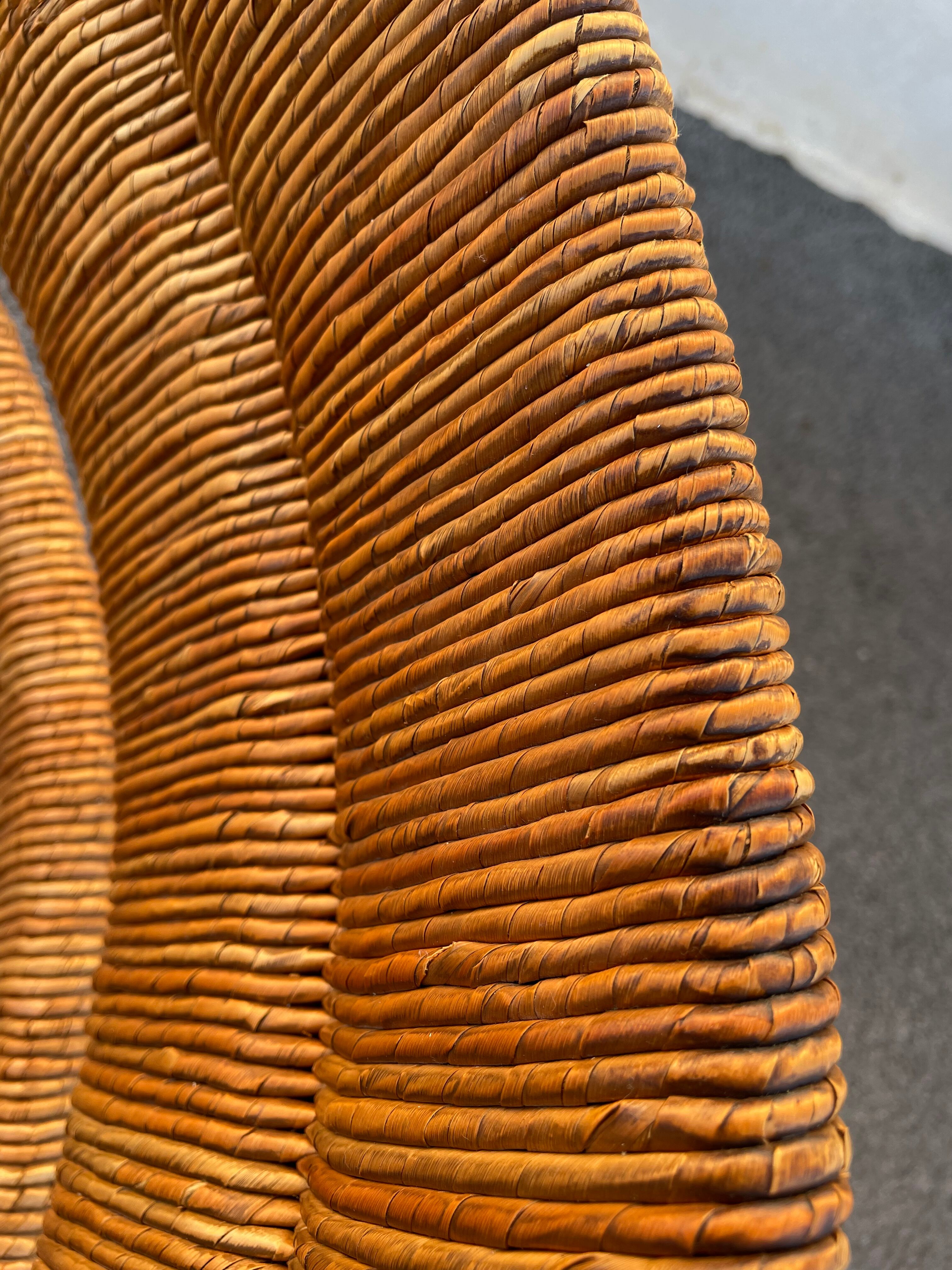Vintage armchair in straw and brutalist wood