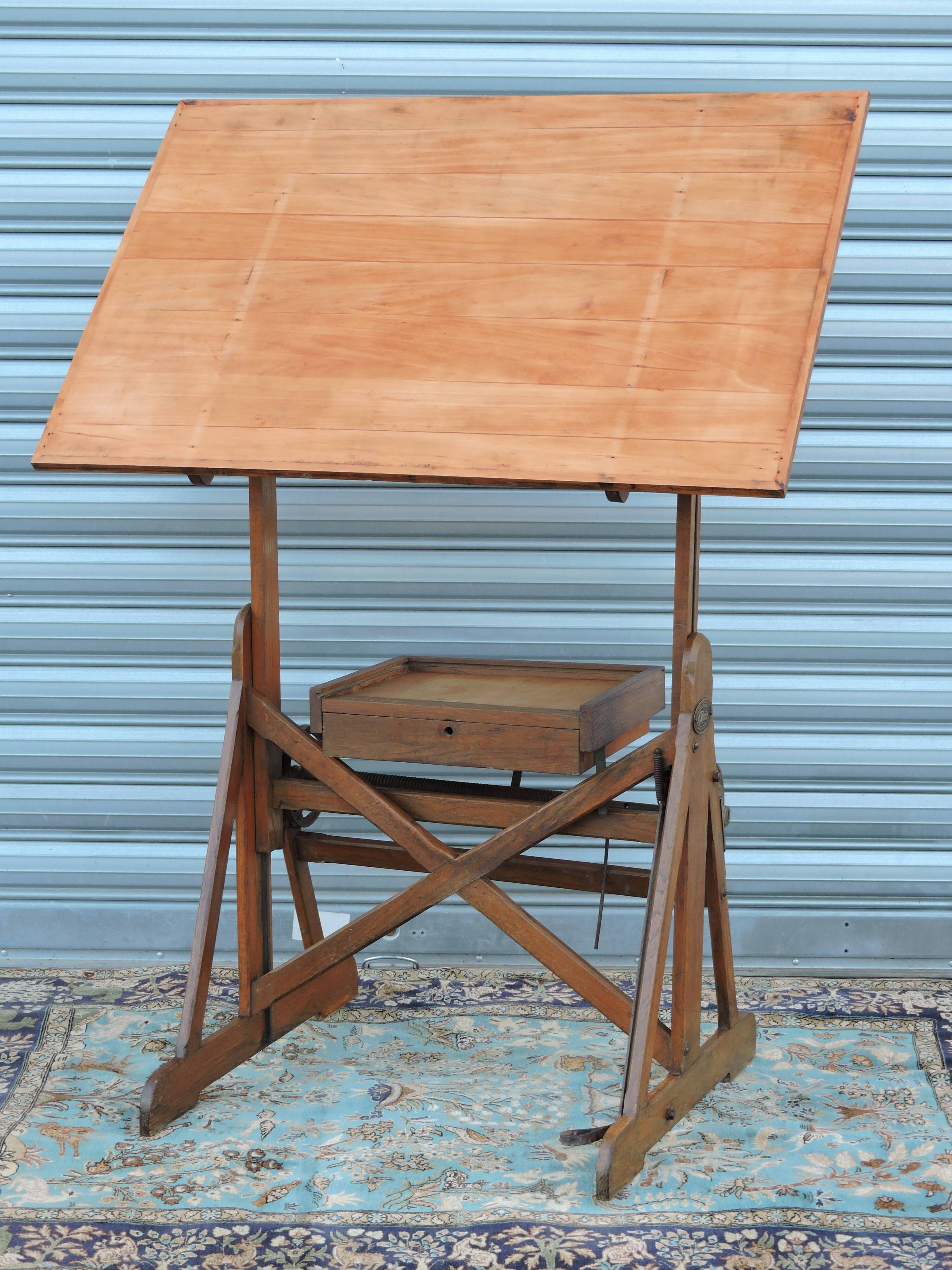 Architect's table has industrial adjustable design H Morin betting