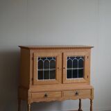 20th-century solid oak display cabinet with a glass front, by a Danish cabinetmaker.