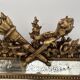 Louis XVI style mirror with parecloses in wood and gilded stucco, 19th century