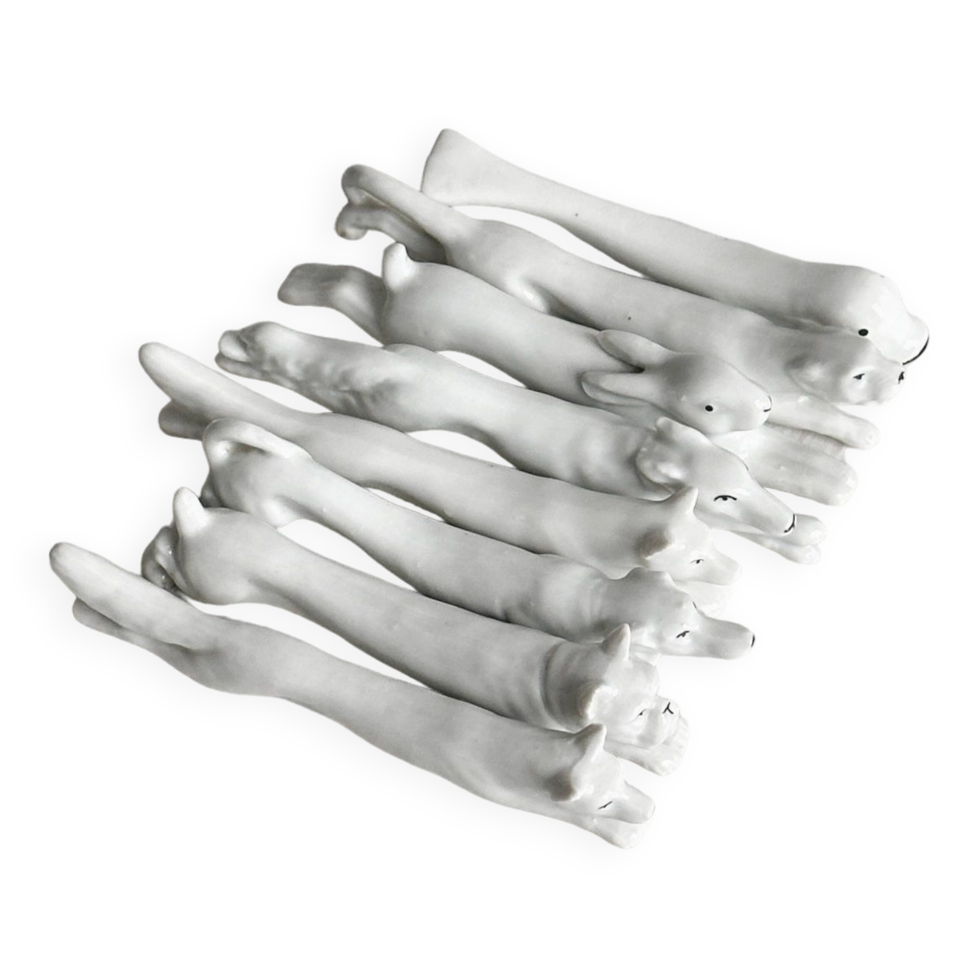 Porcelain animal knife holder.