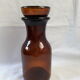Apothecary bottle jar in amber brown glass with cap