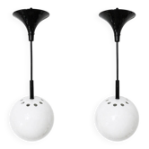 Two white metal globe pendant lights, 1970s.