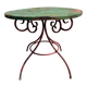 Table de jardin à volutes