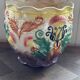 Earthenware cache-pot from the early 20th century.