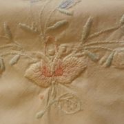 White tablecloth embroidered with lace & days