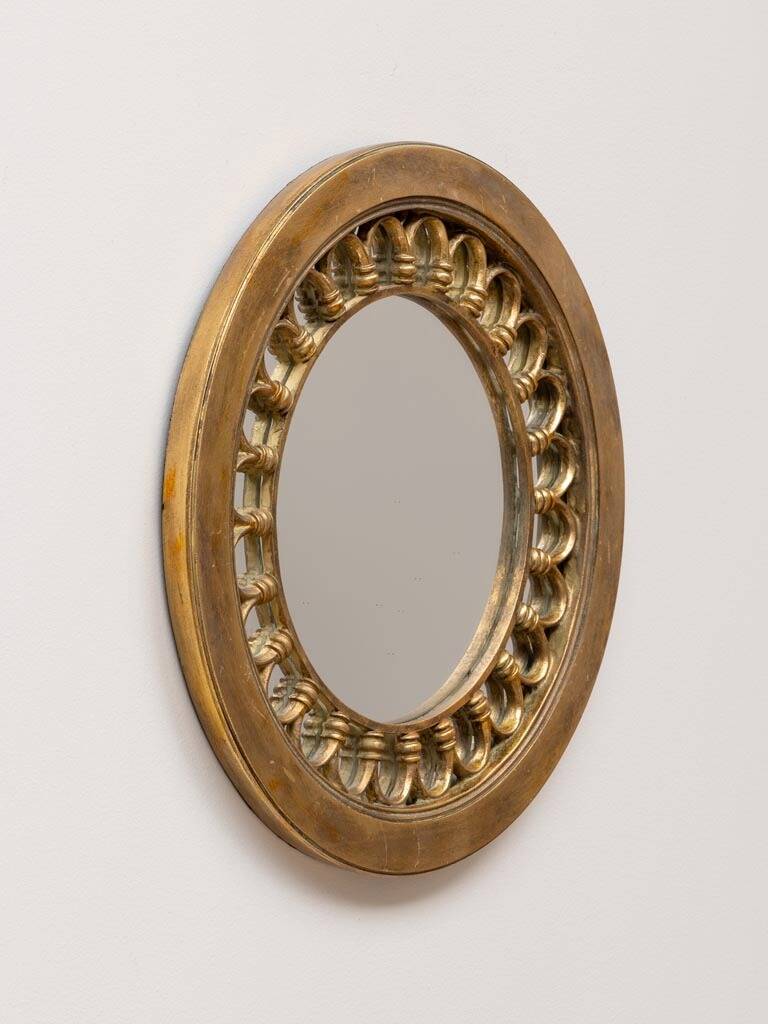Round golden mirror