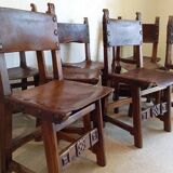 Set of 8 walnut and leather chairs from the 1950s