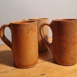 Set of three large sandstone mugs