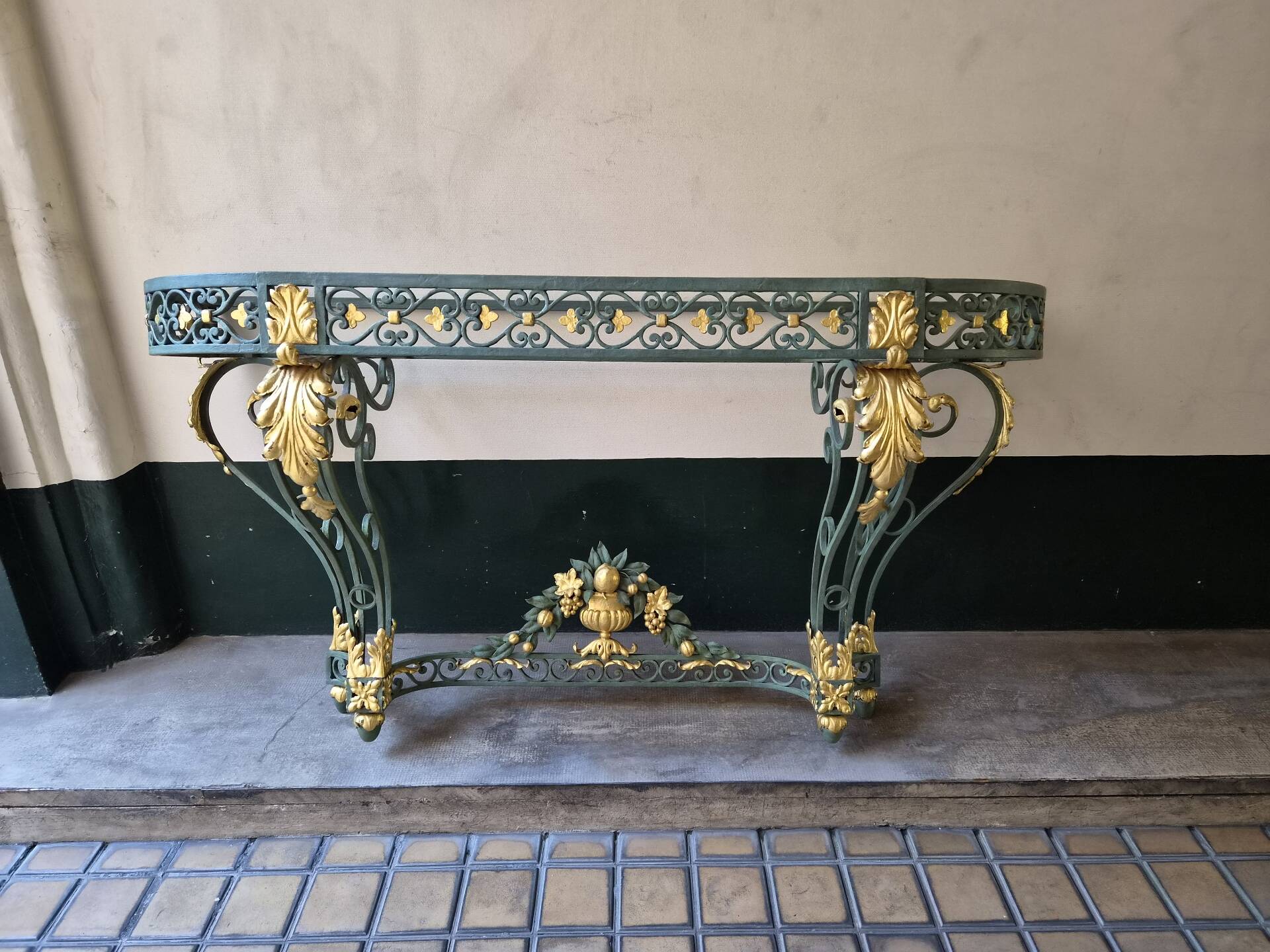 Wrought iron console in Louis XV style, 19th century.