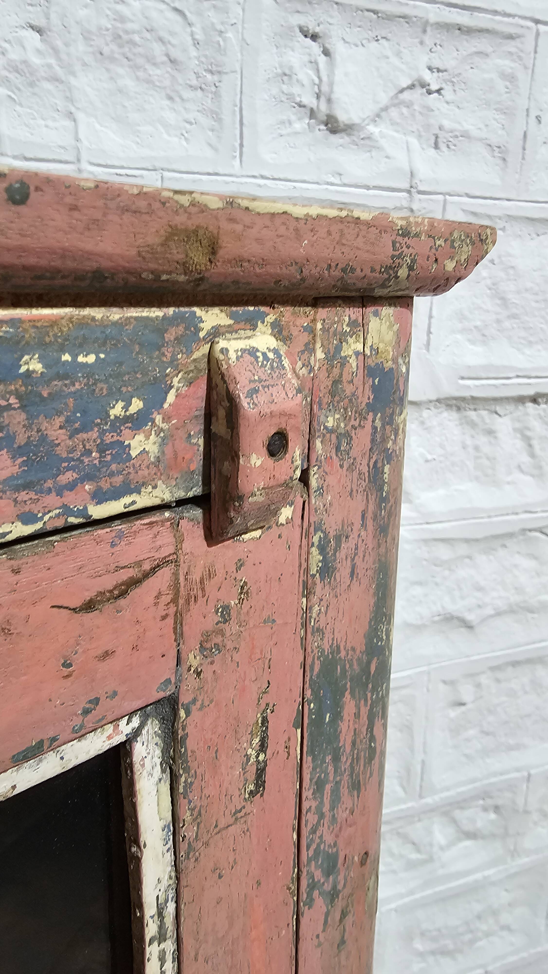 Pink showcase in Burmese teak