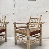 Pair of wooden armchairs and ropes