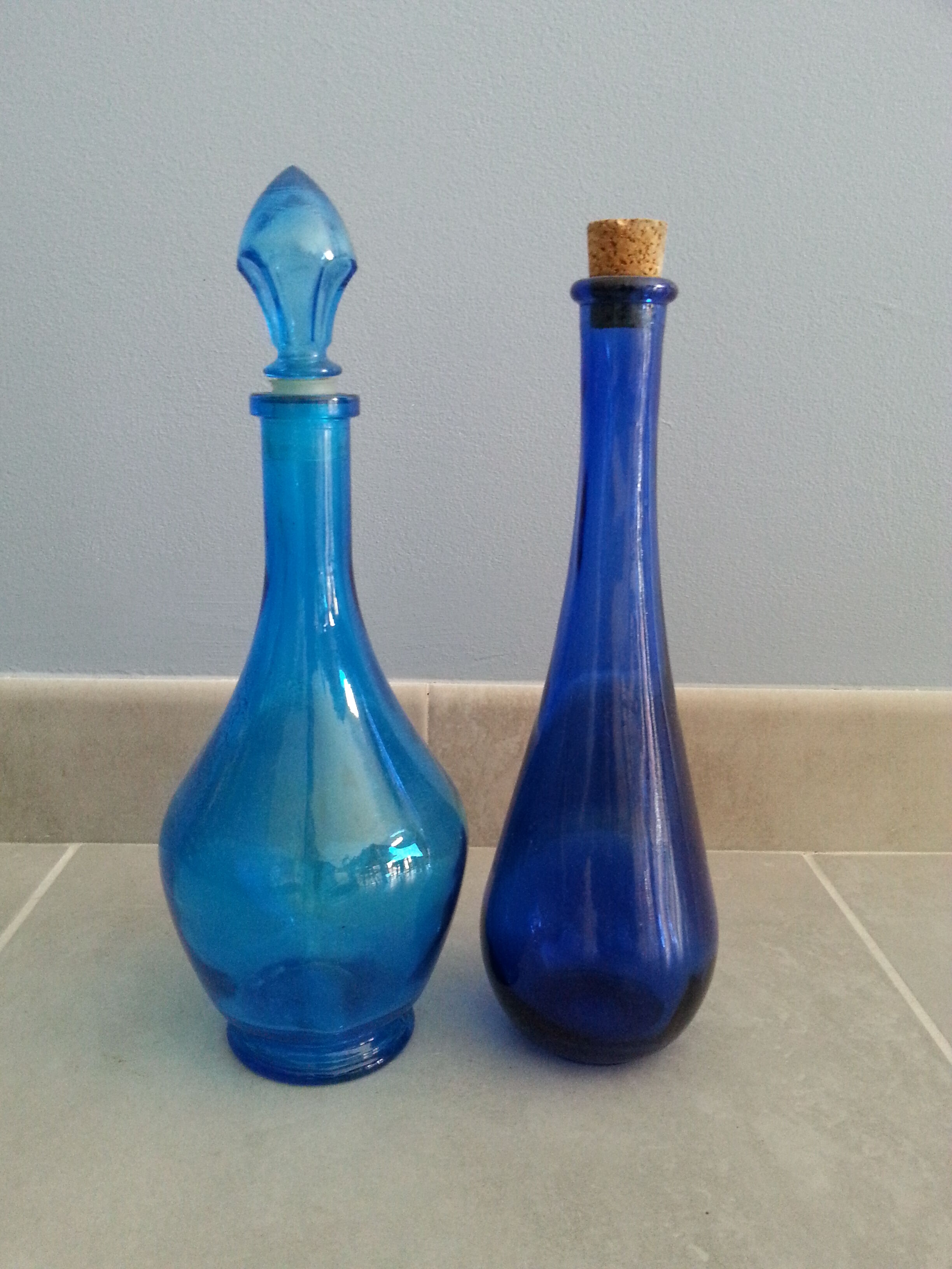 Lot 2 blue glass bottles