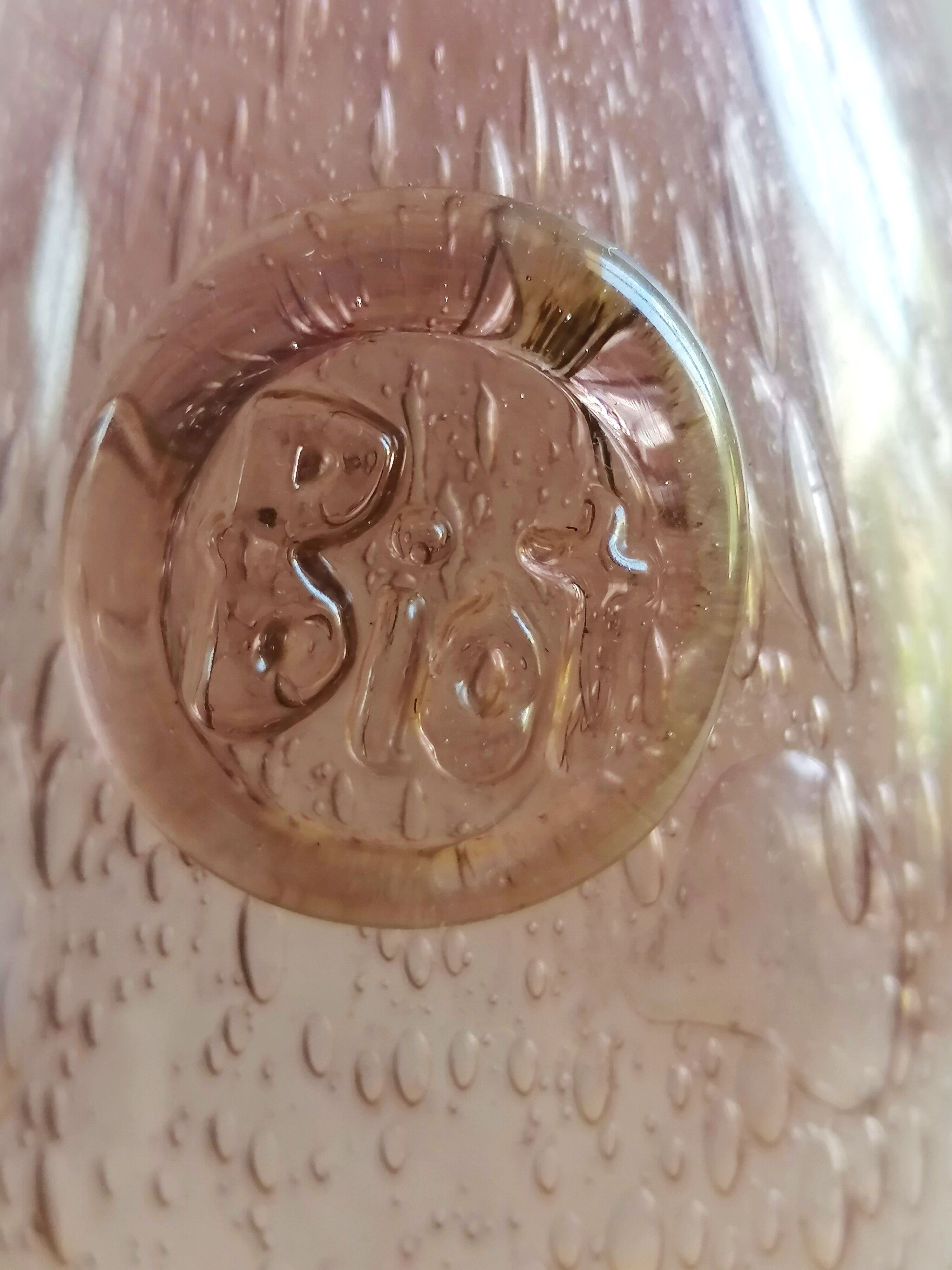 Biot bubble glass bottle
