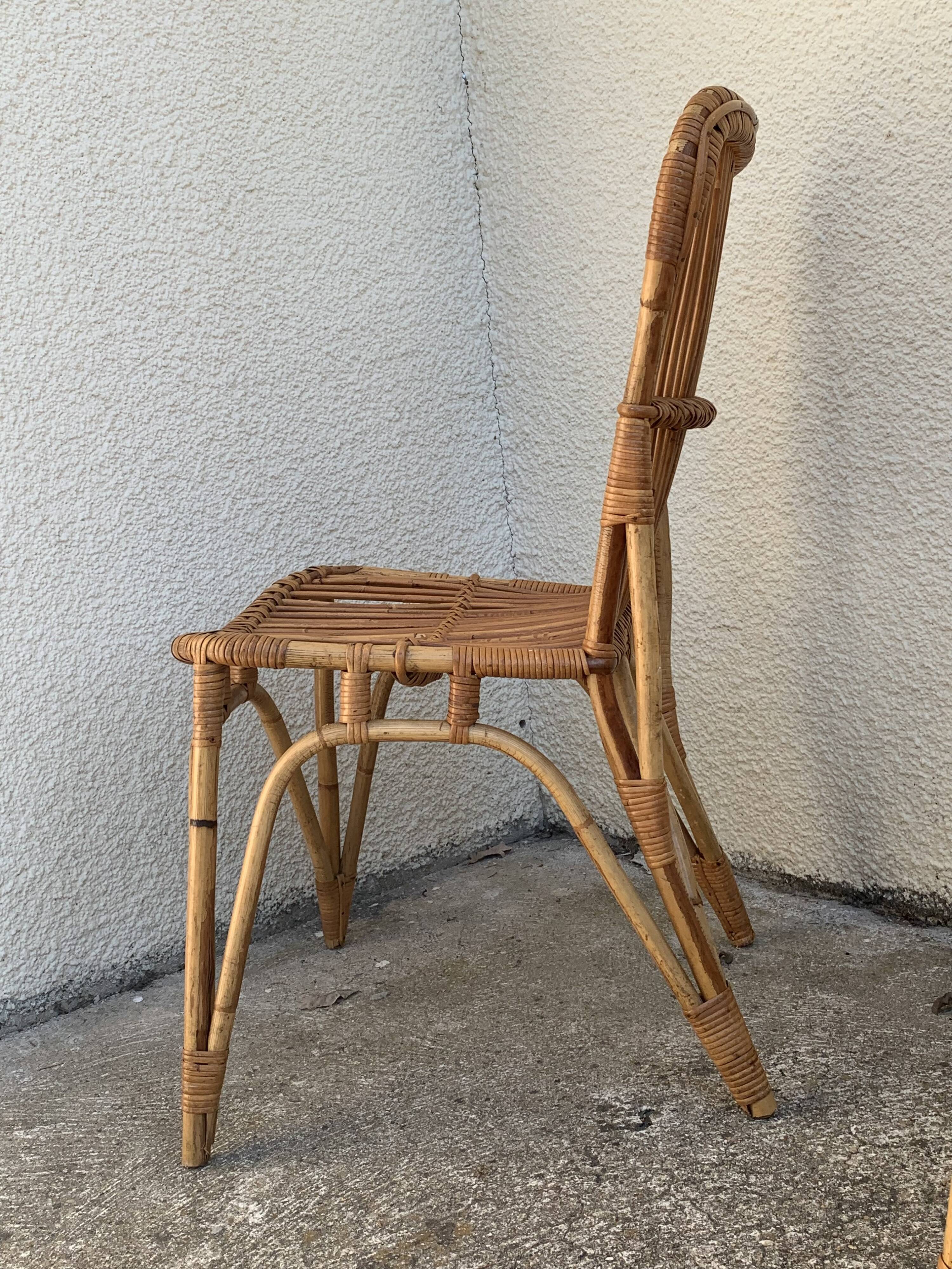 Chair and armchair in vintage rattan 1950