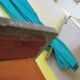 Empire/Restoration style console table with scrolled ends, mirrored back, and claw feet.