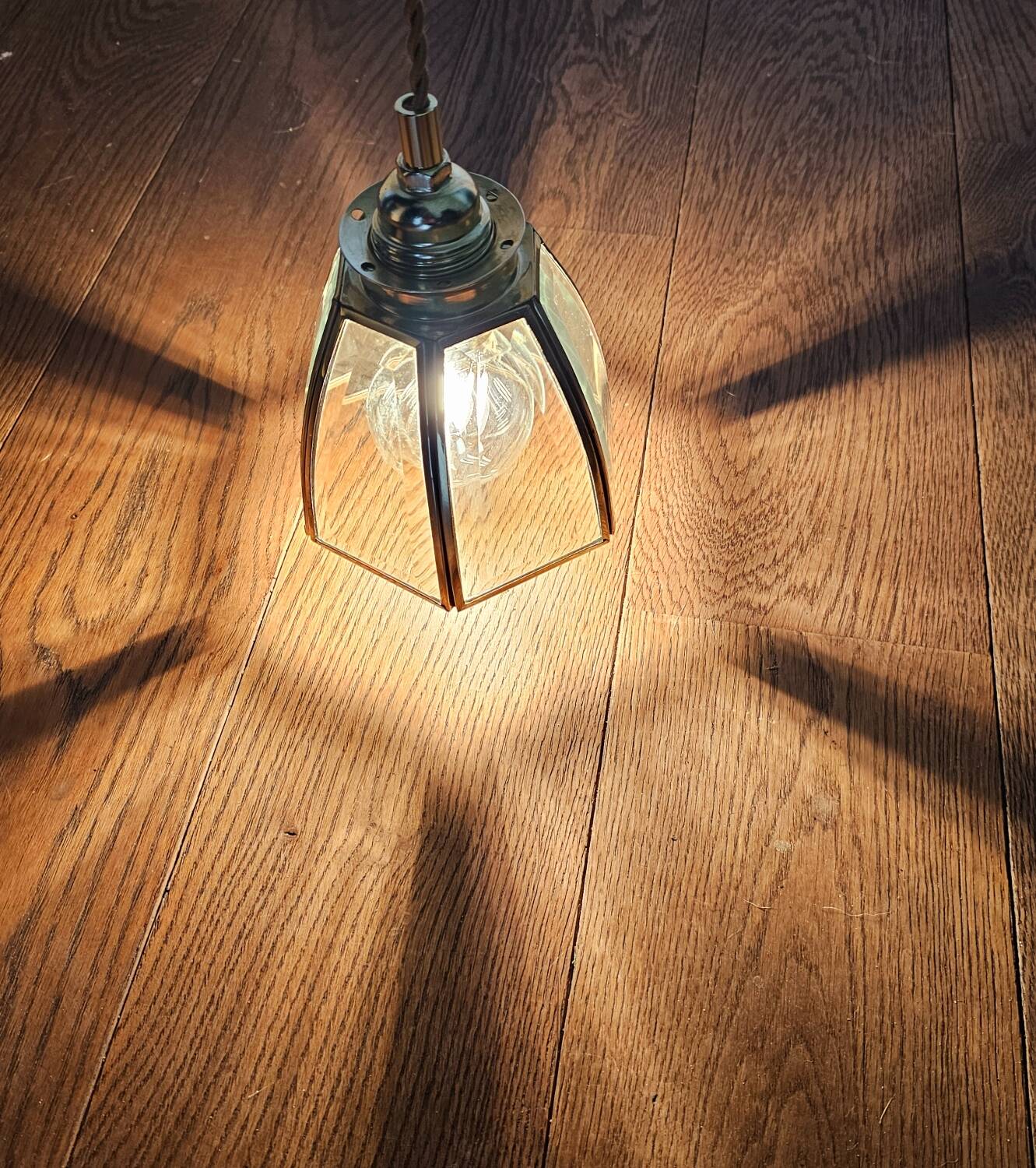 Antique portable lamp with chiseled glass and brass