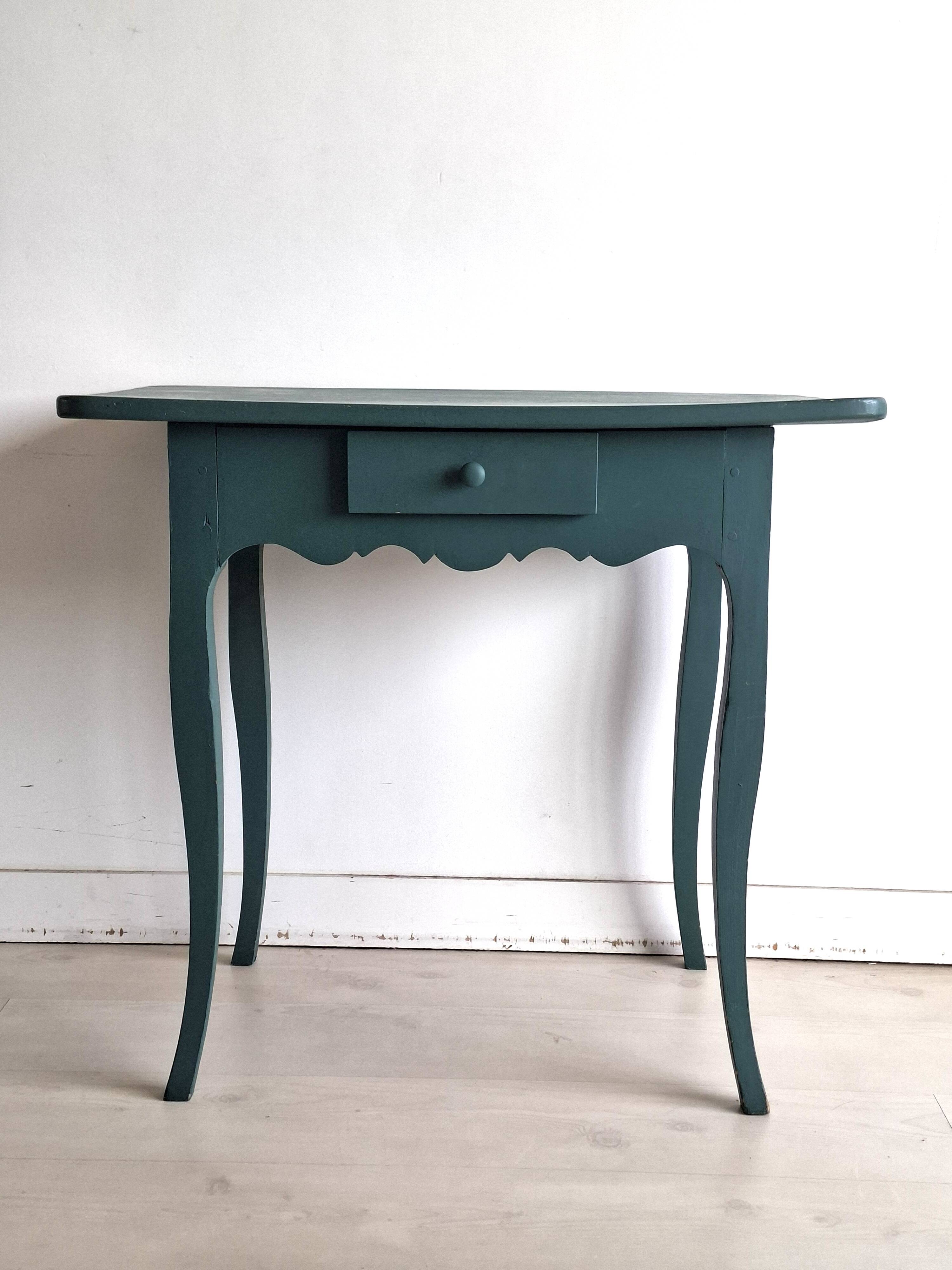 Antique Gustavian-style table painted in dark green with a drawer.