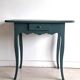 Antique Gustavian-style table painted in dark green with a drawer.