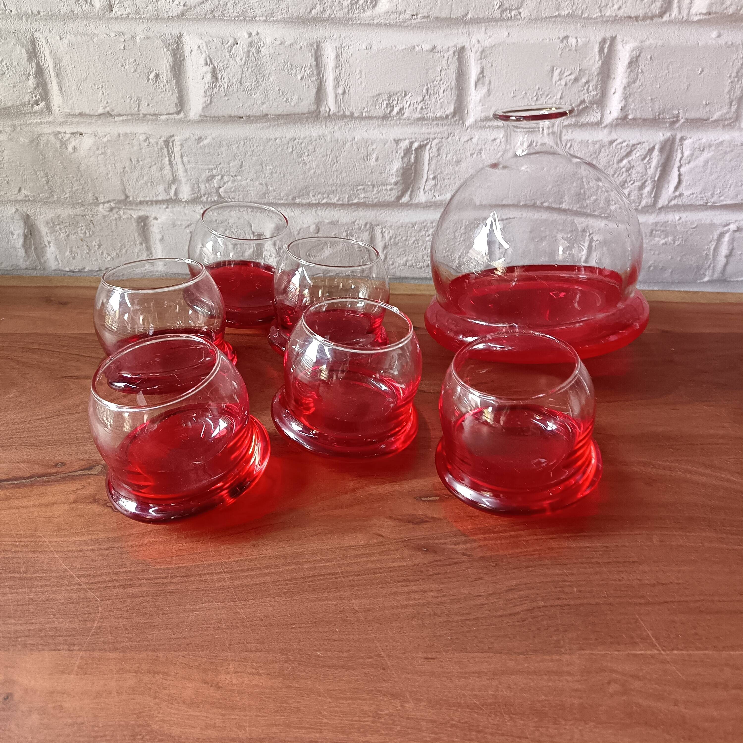 Vintage red designer glasses and carafe set, tumbler glass base