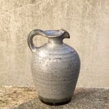 The pitcher / vase in ancient sandstone