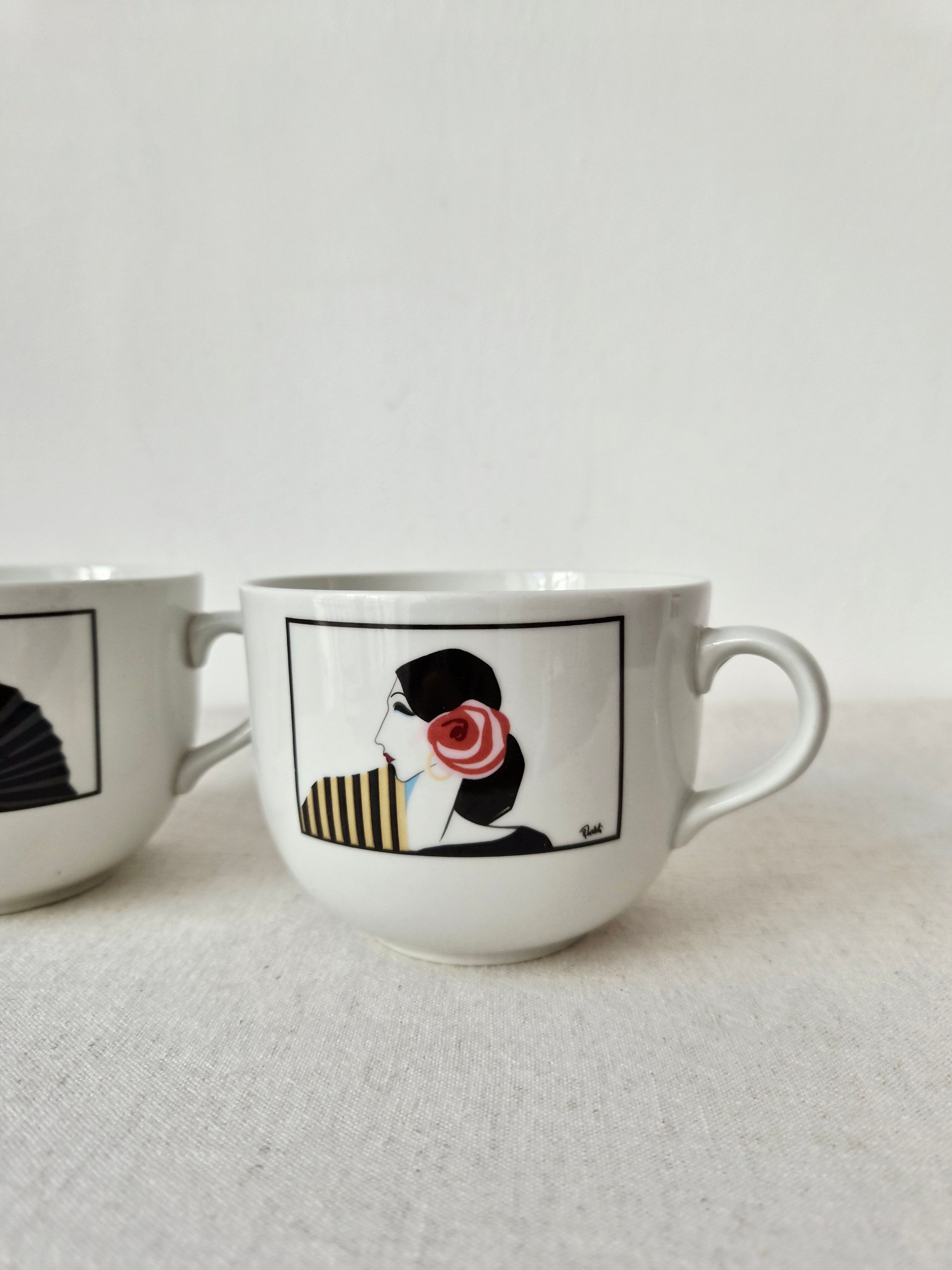 Set of 2 large Art Deco porcelain mugs by Roberto Tortoli.