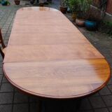 Extensible Napoleon III table in walnut, late 19th century.