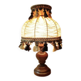 Wood bedside lamp with dome shade in granny chic style.