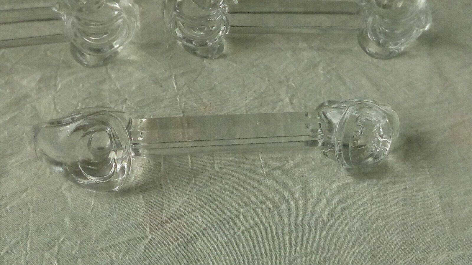 Suite of 7 yer glass knife holders deposited little duck