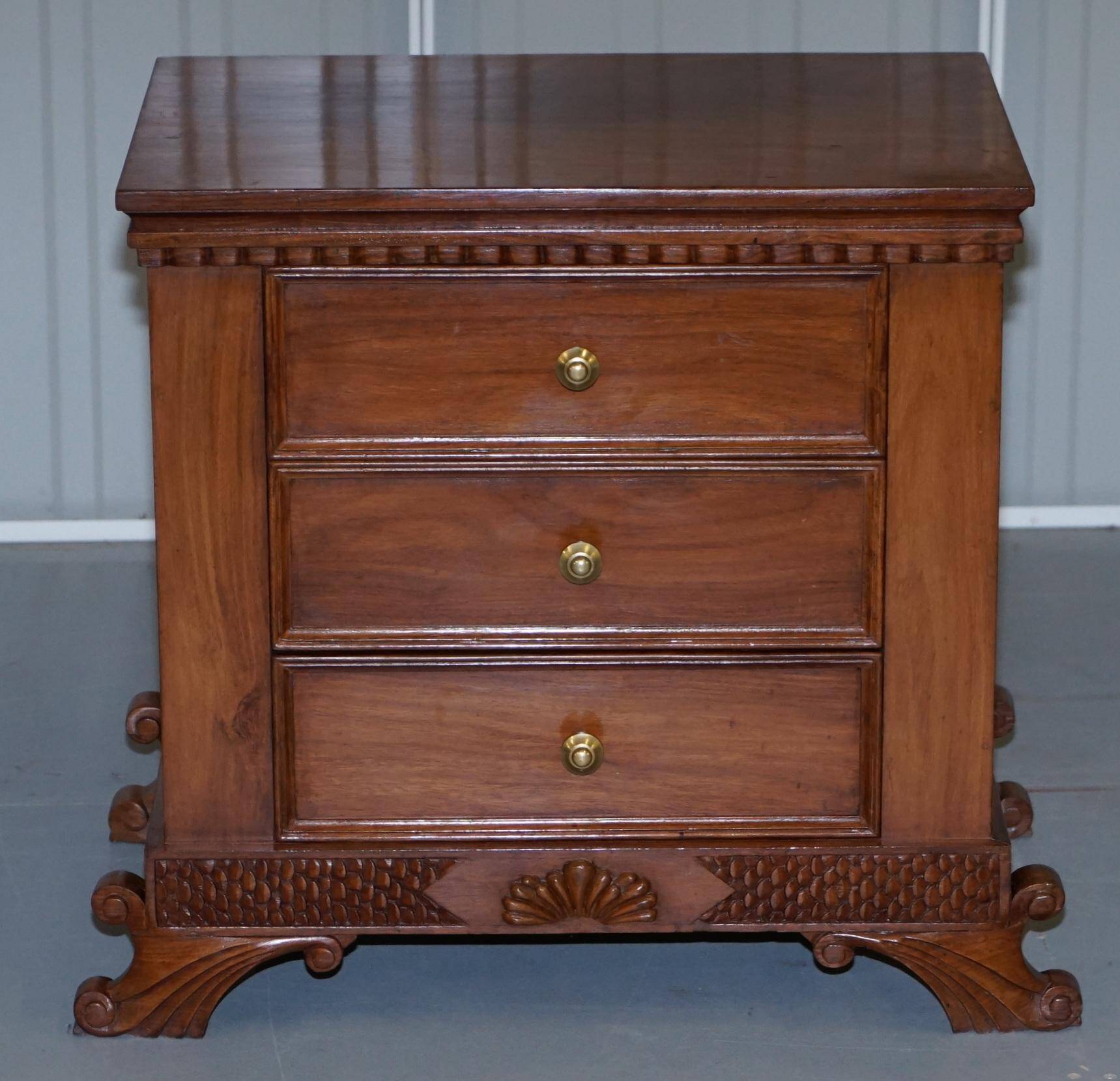 Set of hardwood dressers with finely carved bases.
