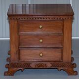Set of hardwood dressers with finely carved bases.