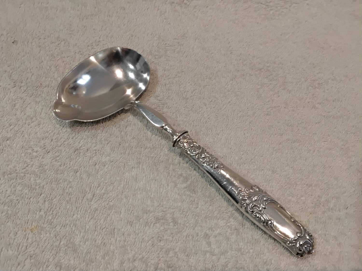Ladle with a handle, 950 silver Minerva, Rocaille style, Ravinet.
