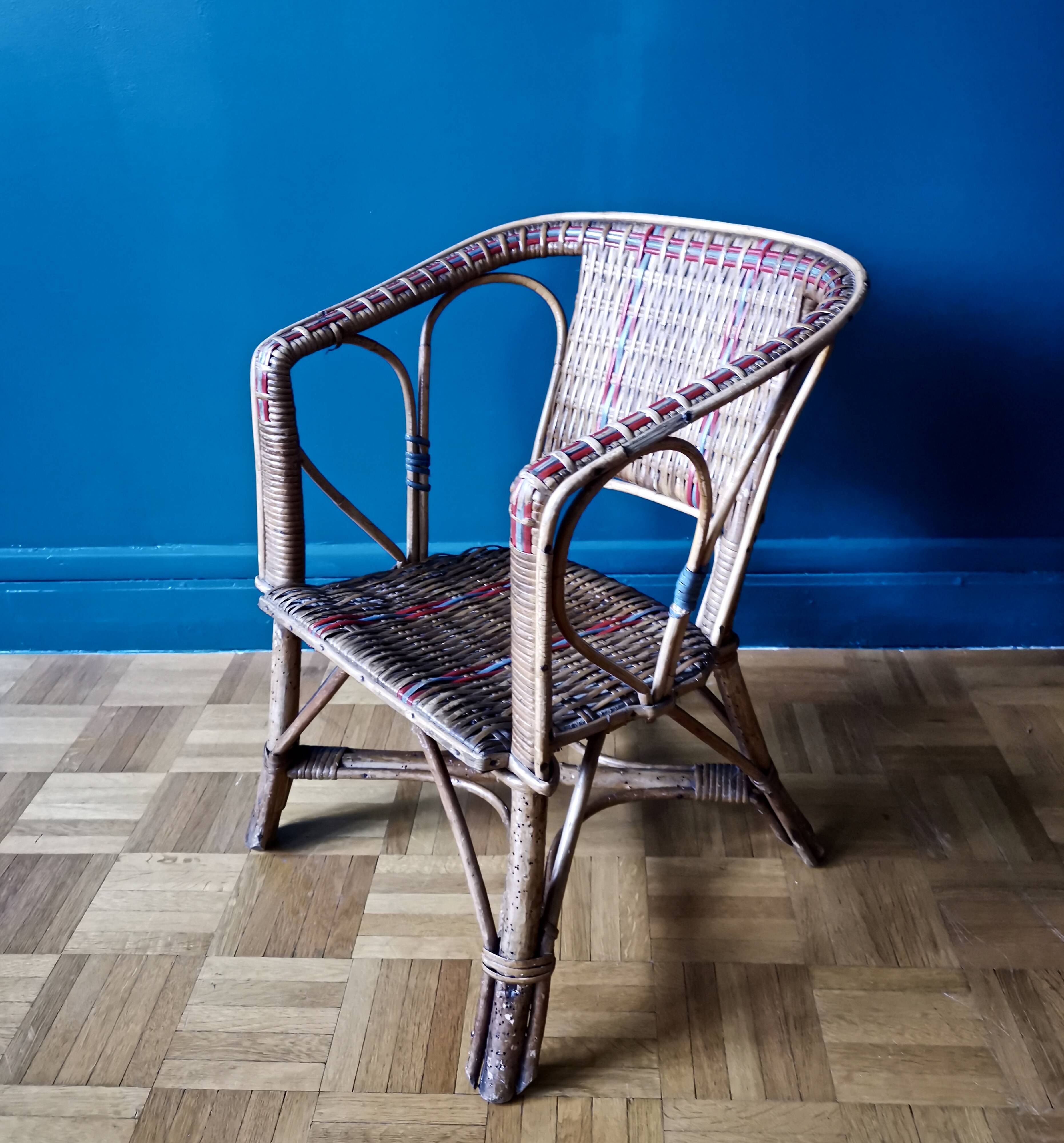Small child vintage armchair in rattan